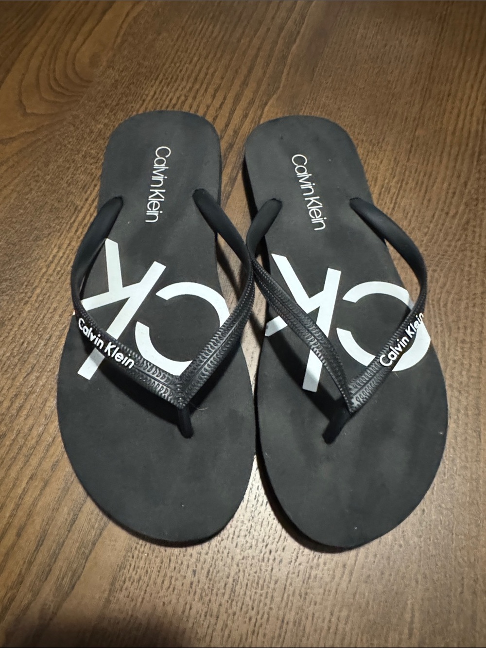Calvin Klein Black Flip Flop Sandals with White CK Logo